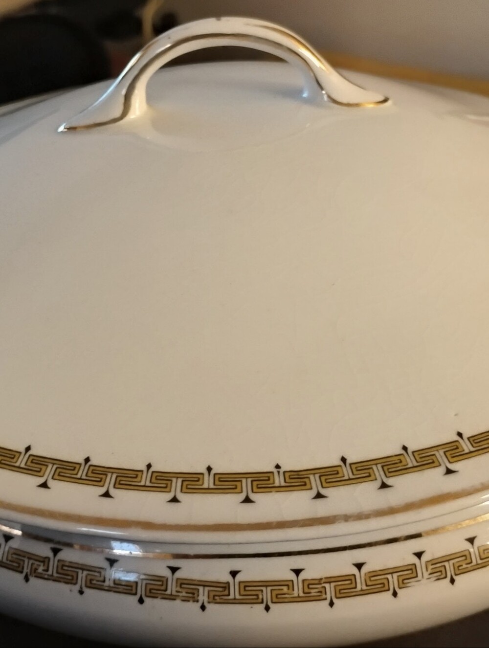 Elegant White Porcelain Covered Serving Dish with Gold Trim